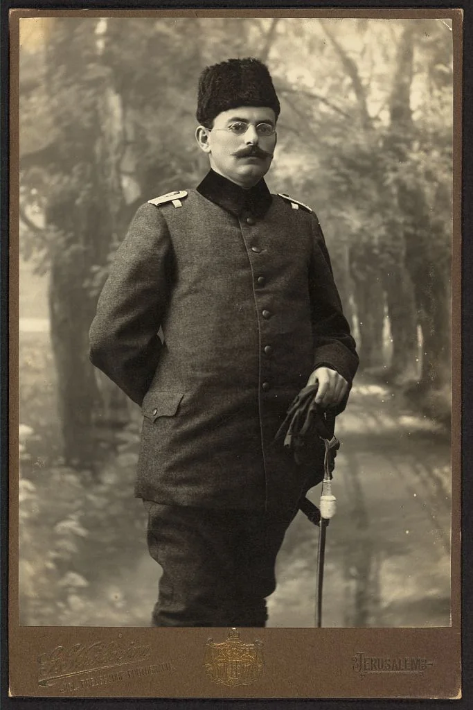Studio portrait of Tawfiq Canaan in 1905, three-quarter length, standing, in uniform